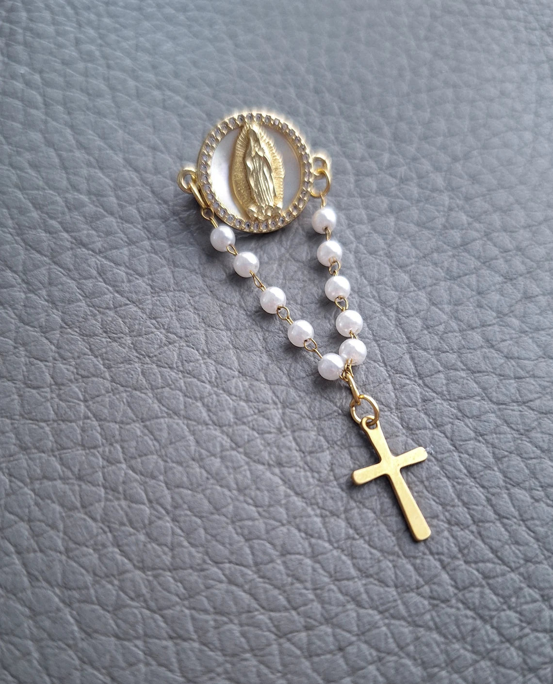 Faith & Elegance – Virgin Mary Rosary Pin with Mother of Pearl Accent