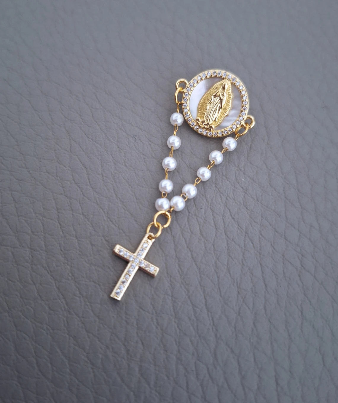 Faith & Elegance – Virgin Mary Rosary Pin with Mother of Pearl Accent