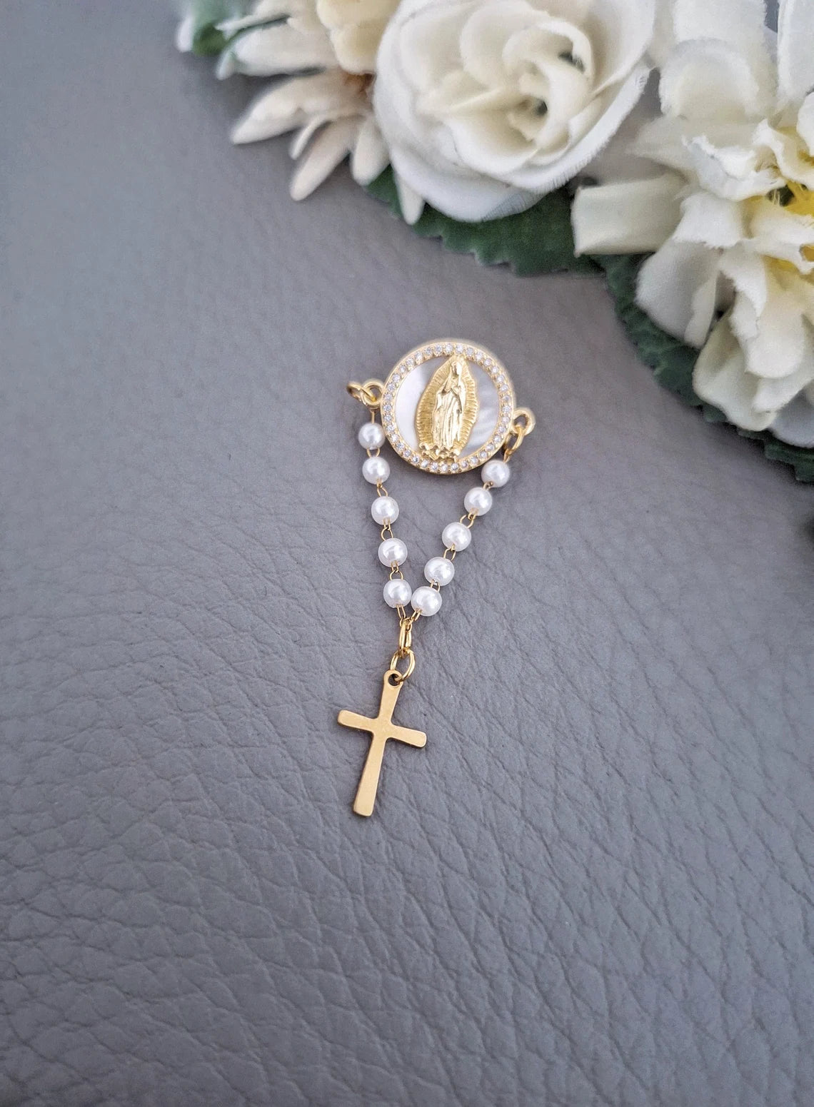 Faith & Elegance – Virgin Mary Rosary Pin with Mother of Pearl Accent