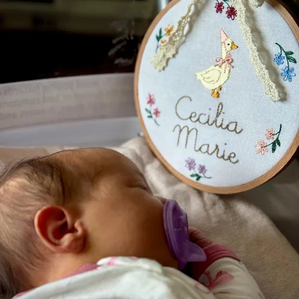 Personalized Round Baby Name Embroidered Plaque – Goose & Floral Wreath